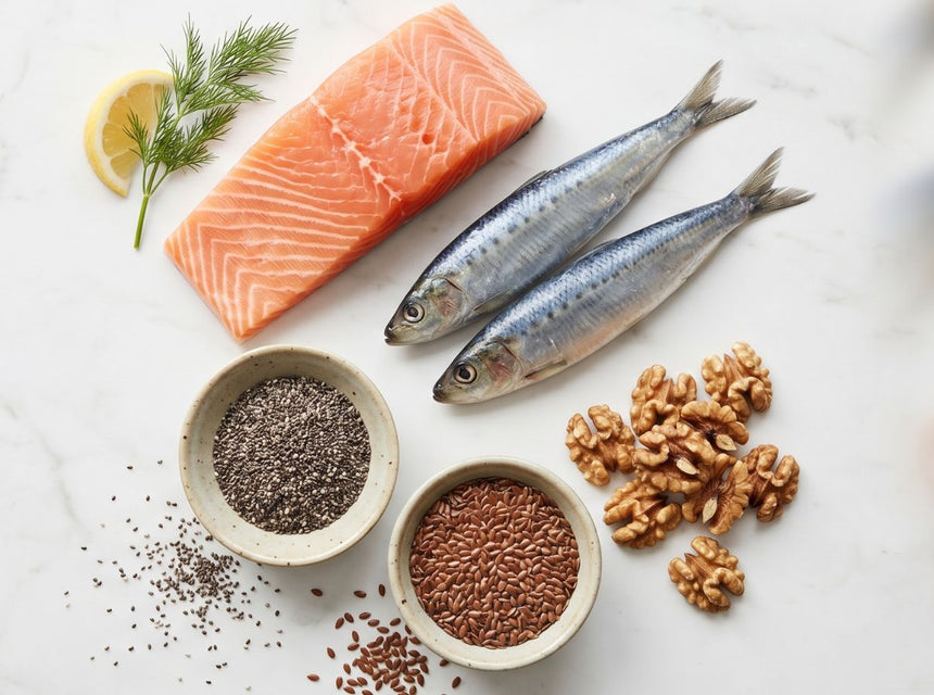 Omega-3-rich foods including salmon, sardines, walnuts, chia seeds and flaxseeds